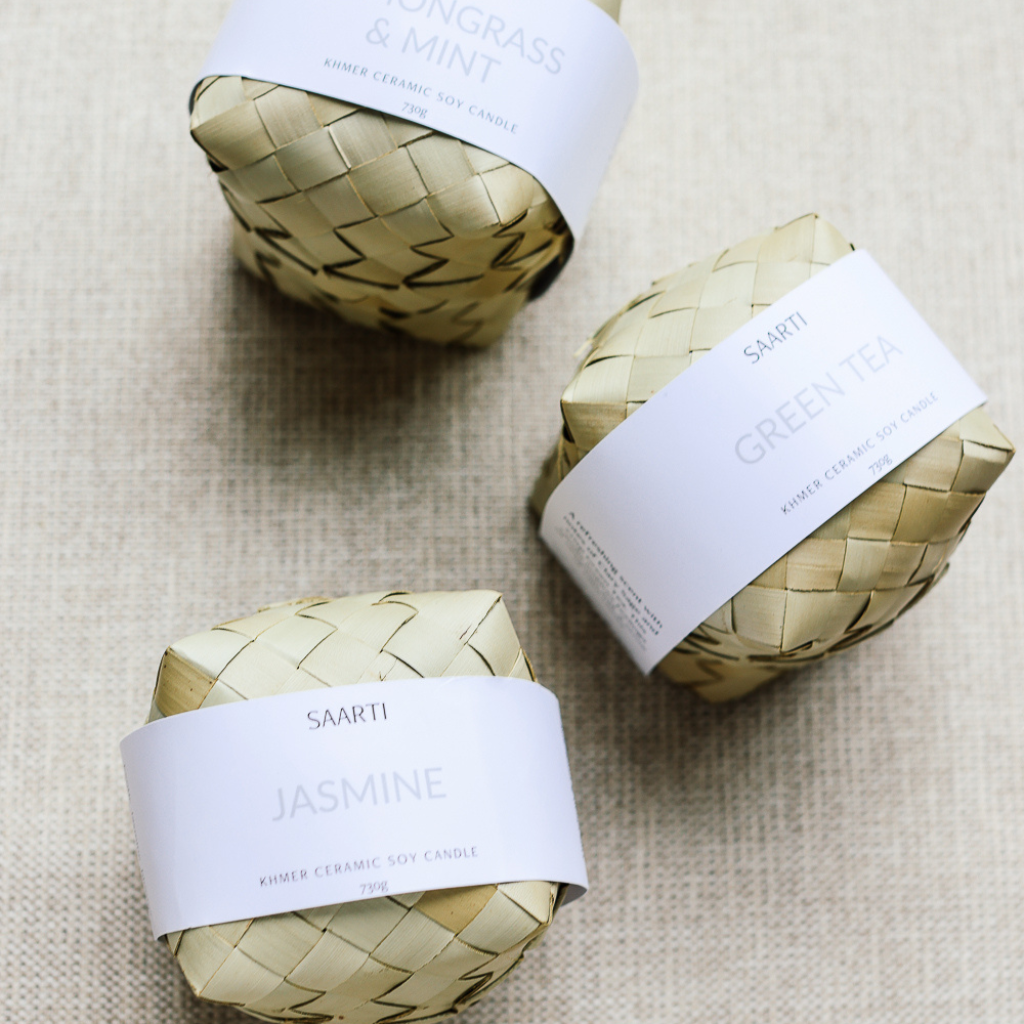 Soy candle with Jasmine essential oil. Handmade white ceramic candle, gifts Cambodia, made in Cambodia. Natural palm leaf packaging.